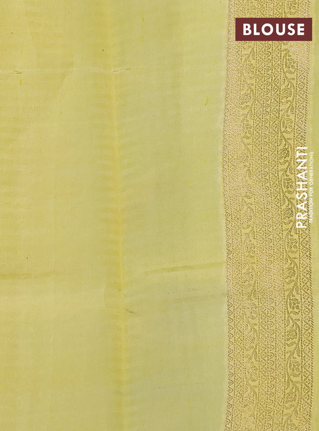 Chiniya silk saree pale yellow and yellow with allover zari weaves & digital prints and zari woven border