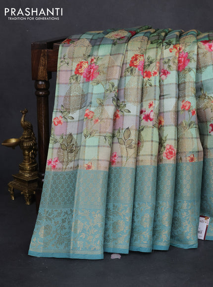 Chiniya silk saree muliti colour and pastel blue with allover floral digital prints & zari buttas and long zari woven border