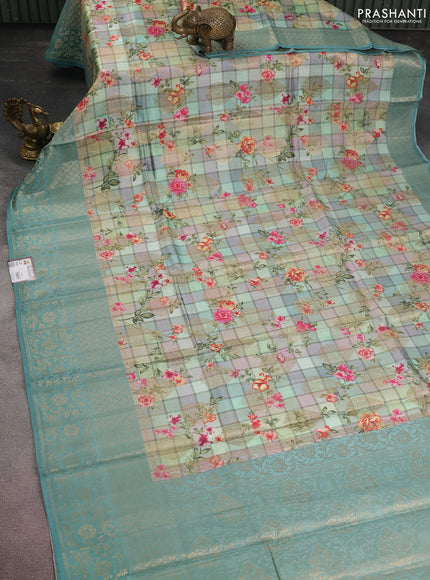 Chiniya silk saree muliti colour and pastel blue with allover floral digital prints & zari buttas and long zari woven border