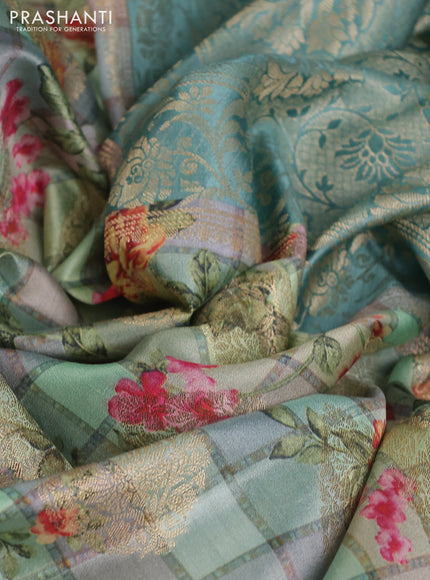 Chiniya silk saree muliti colour and pastel blue with allover floral digital prints & zari buttas and long zari woven border