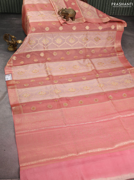 Chiniya silk saree pastel peach orange with allover zari weaves & digital prints and zari woven border