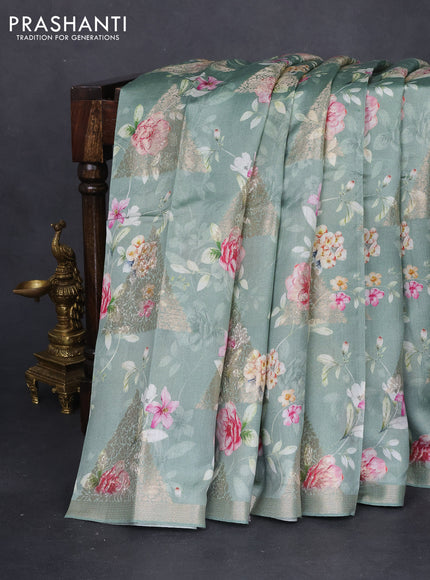 Chiniya silk saree pastel green with allover digital prints & geometric zari buttas and zari woven border