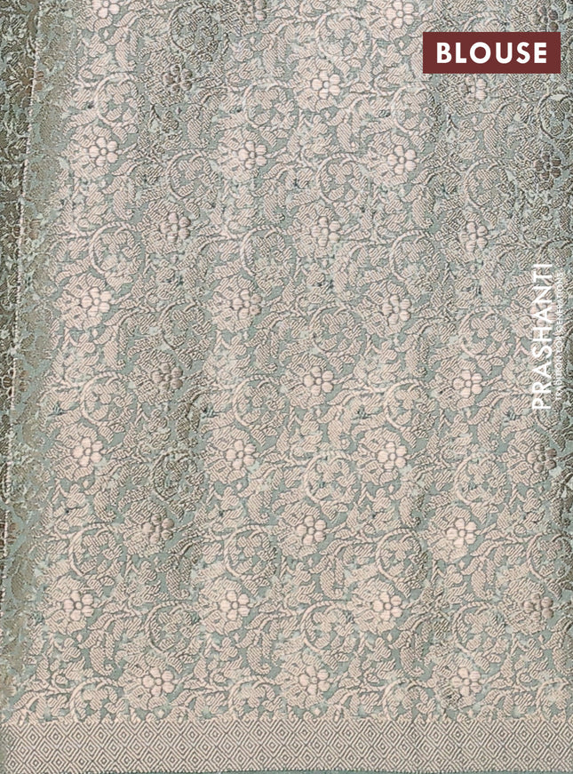 Chiniya silk saree pastel green with allover digital prints & geometric zari buttas and zari woven border