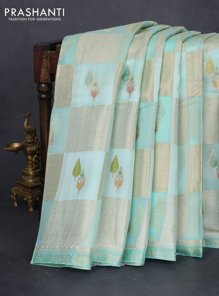 Chiniya silk saree teal green shade with allover geometric zari weaves & digital prints and zari woven border