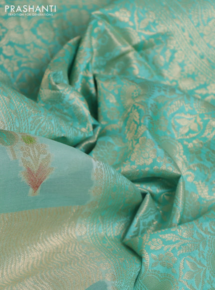 Chiniya silk saree teal green shade with allover geometric zari weaves & digital prints and zari woven border