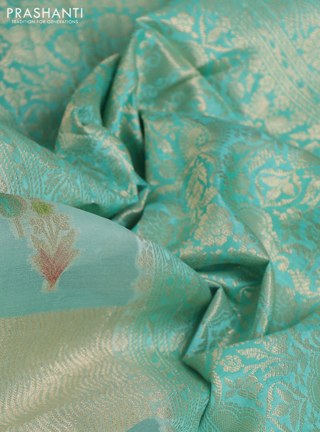 Chiniya silk saree teal green shade with allover geometric zari weaves & digital prints and zari woven border