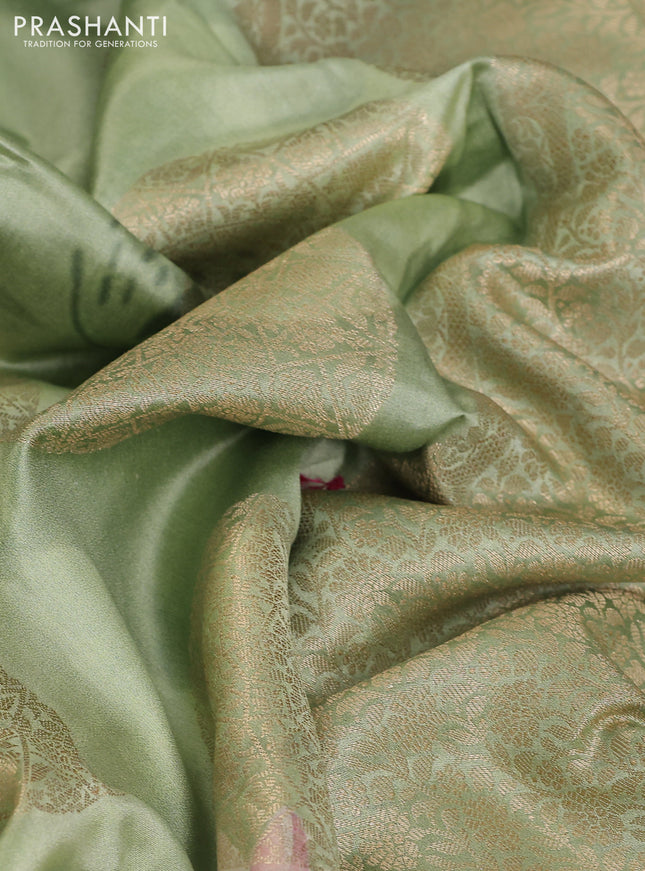 Chiniya silk saree pastel green with zari buttas & floral digital prints and woven border