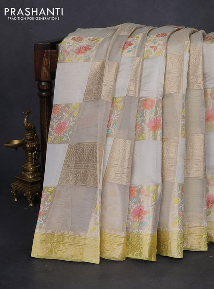Chiniya silk saree pastel grey and lime yellow with allover zari weaves & floral digital prints and zari woven border