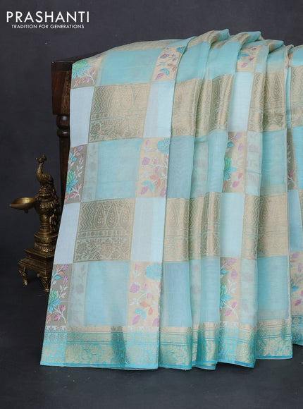 Chiniya silk saree mild teal blue and teal blue with allover zari weaves & floral digital prints and zari woven border