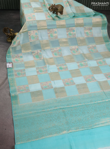 Chiniya silk saree mild teal blue and teal blue with allover zari weaves & floral digital prints and zari woven border