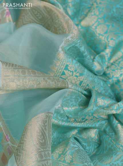 Chiniya silk saree mild teal blue and teal blue with allover zari weaves & floral digital prints and zari woven border