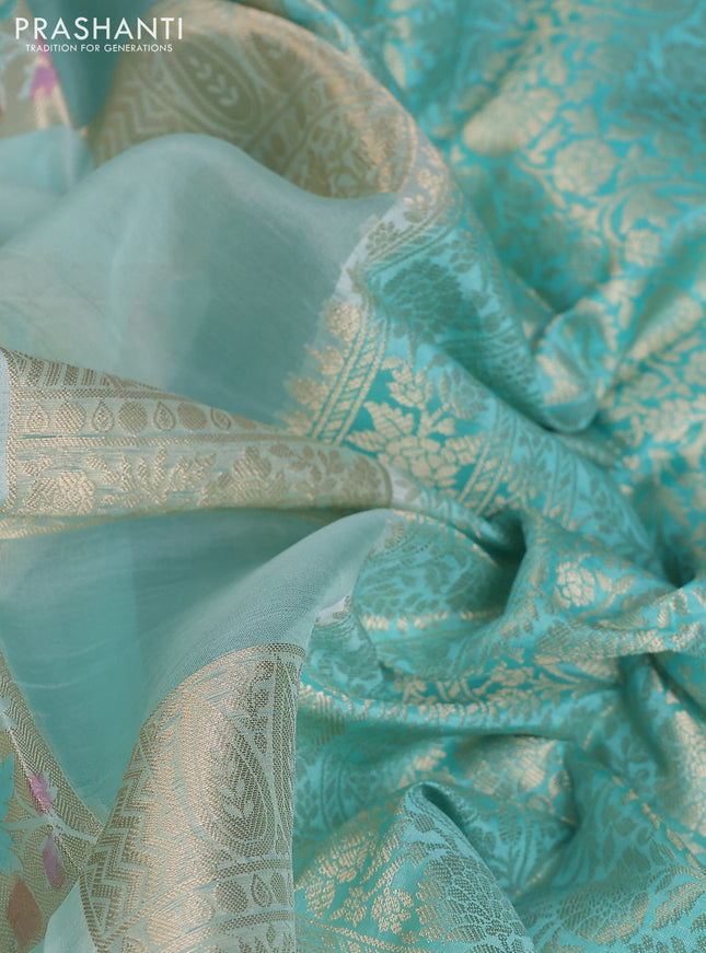 Chiniya silk saree mild teal blue and teal blue with allover zari weaves & floral digital prints and zari woven border