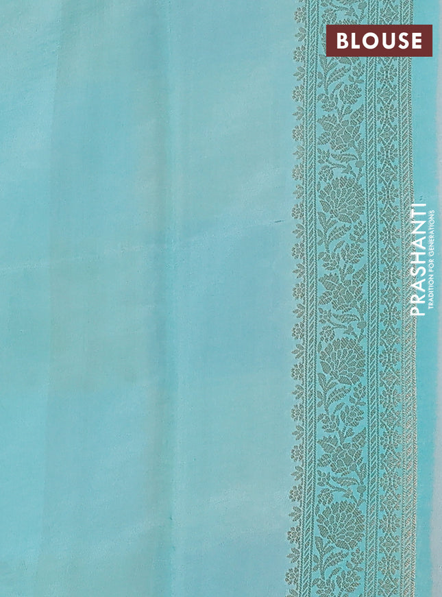 Chiniya silk saree mild teal blue and teal blue with allover zari weaves & floral digital prints and zari woven border