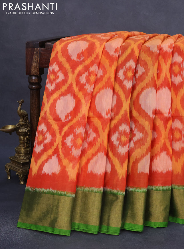 Ikat silk cotton saree orange and light green with allover ikat weaves and zari woven border