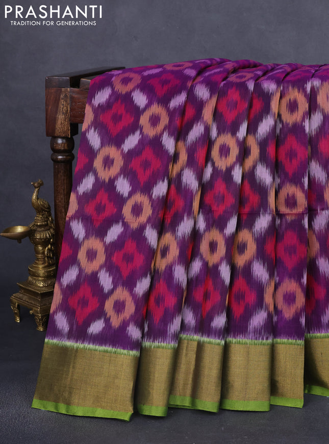 Ikat silk cotton saree violet and green with allover ikat weaves and zari woven border