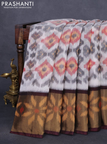 Ikat silk cotton saree cream and coffee brown with allover ikat weaves and long zari woven ikat border