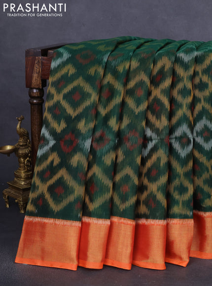 Ikat silk cotton saree dark green and rustic orange with allover ikat weaves and zari woven border