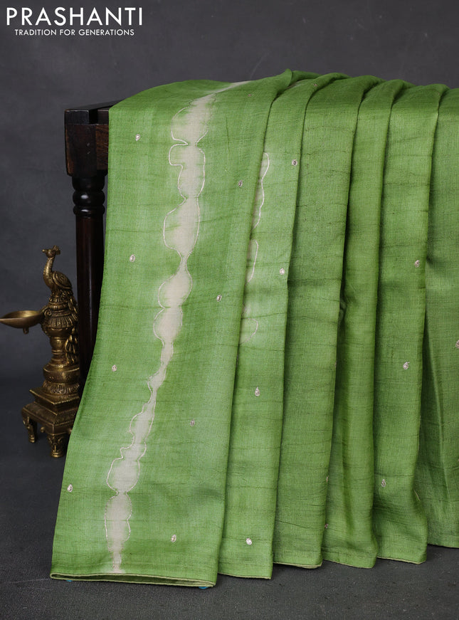 Pure tussar silk saree green and pastel blue with tie & dye prints and pita work pallu
