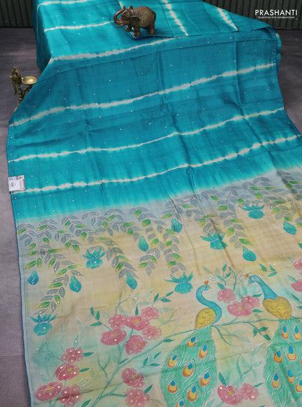 Pure tussar silk saree teal blue and cream with tie & dye prints and pita work pallu