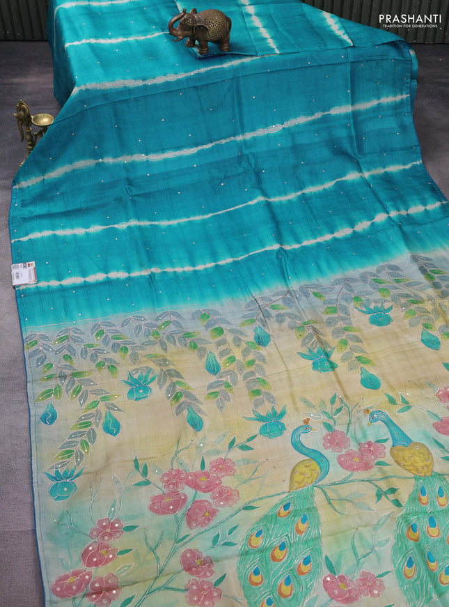 Pure tussar silk saree teal blue and cream with tie & dye prints and pita work pallu