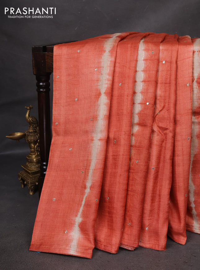 Pure tussar silk saree rustic orange and pastel grey with tie & dye prints and pita work pallu