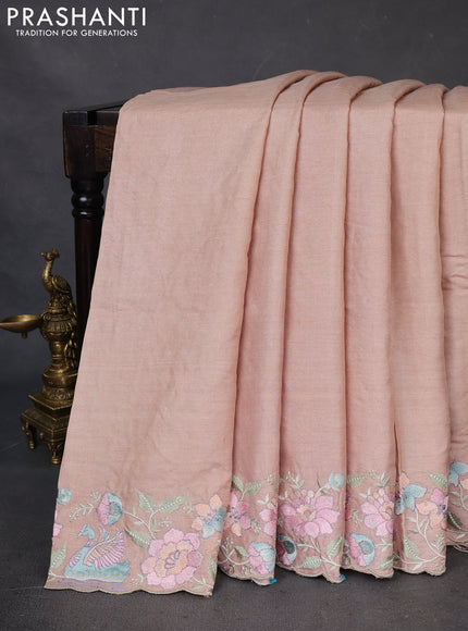Pure tussar silk saree pastel peach with plain body and floral design embroidery border