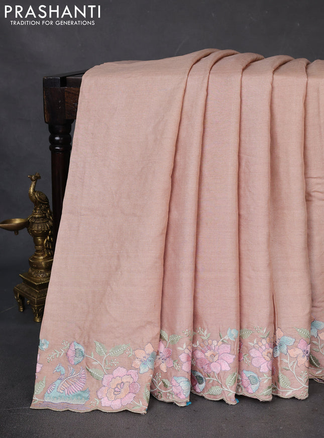 Pure tussar silk saree pastel peach with plain body and floral design embroidery border