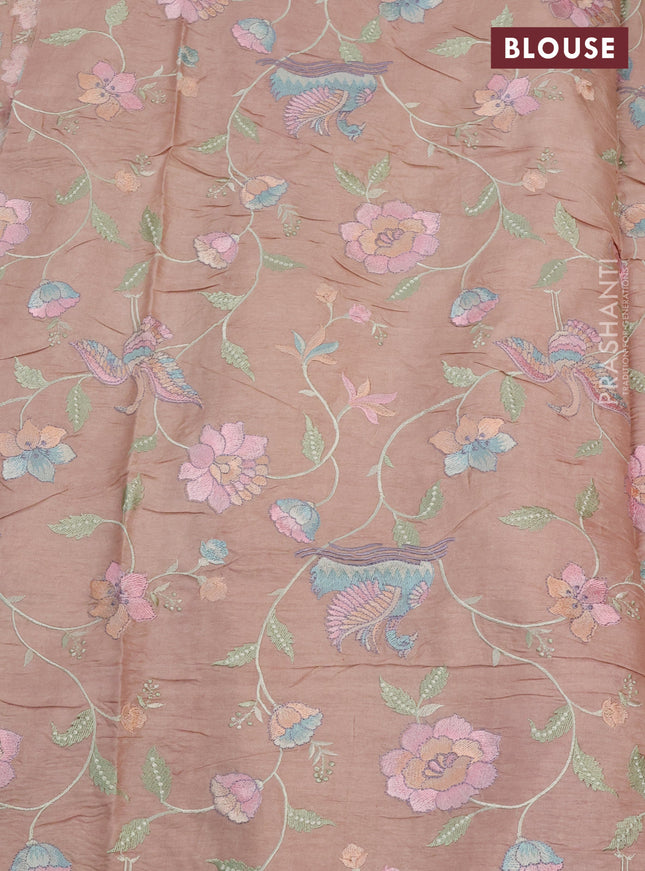 Pure tussar silk saree pastel peach with plain body and floral design embroidery border
