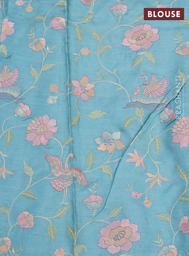 Pure tussar silk saree light blue with plain body and floral design embroidery border