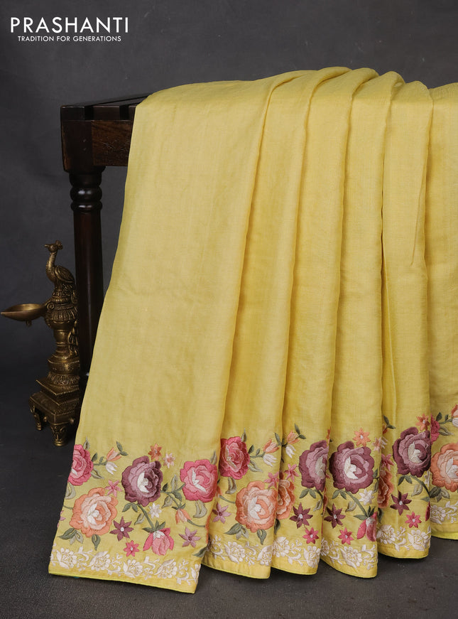 Pure tussar silk saree lime yellow with plain body and floral design embroidery border