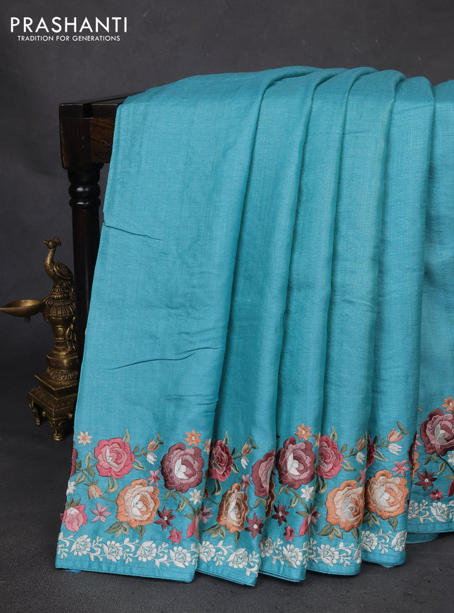 Pure tussar silk saree teal blue with plain body and floral design embroidery border