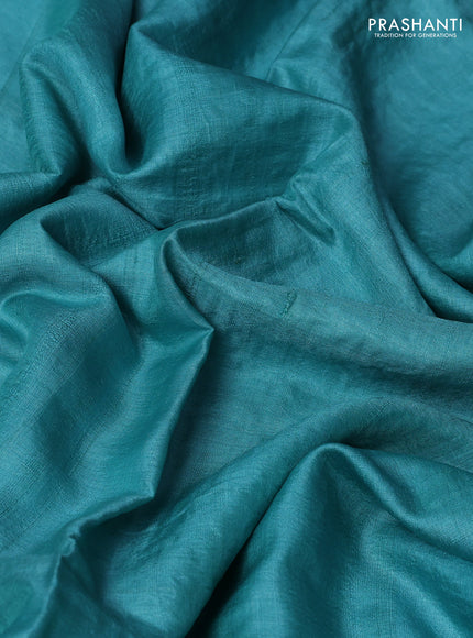 Pure tussar silk saree teal blue with plain body and floral design embroidery border