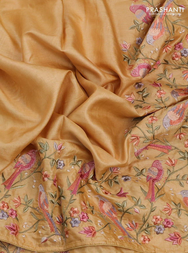 Pure tussar silk saree yellow shade with plain body and embroidery border