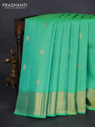 Pure kanchipuram silk saree teal green and dual shade of pinkish orange with allover vairaosi pattern & zari buttas and zari woven border