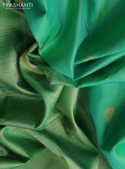 Pure kanchipuram silk saree teal green and dual shade of pinkish orange with allover vairaosi pattern & zari buttas and zari woven border