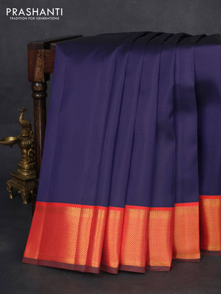 Pure kanchipuram silk saree blue and dual shade of pinkish orange with plain body and zari woven korvai border