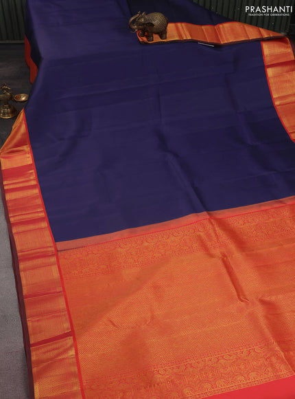 Pure kanchipuram silk saree blue and dual shade of pinkish orange with plain body and zari woven korvai border