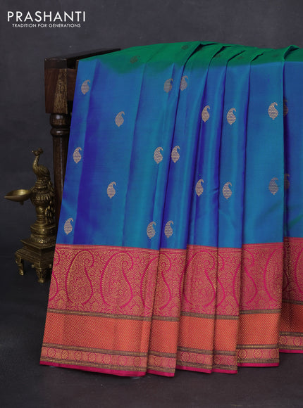 Pure kanchipuram silk saree dual shade of teal blue and pink with paisley zari woven buttas and rich paisley design zari woven border