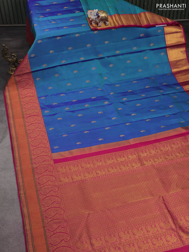 Pure kanchipuram silk saree dual shade of teal blue and pink with paisley zari woven buttas and rich paisley design zari woven border