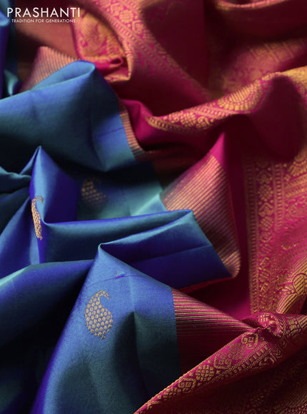 Pure kanchipuram silk saree dual shade of teal blue and pink with paisley zari woven buttas and rich paisley design zari woven border