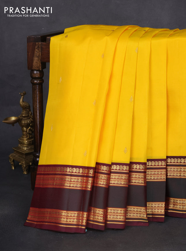 Pure kanchipuram silk saree yellow and wine shade with zari woven buttas and rettapet zari woven border