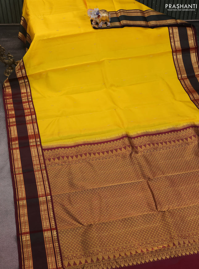 Pure kanchipuram silk saree yellow and wine shade with zari woven buttas and rettapet zari woven border