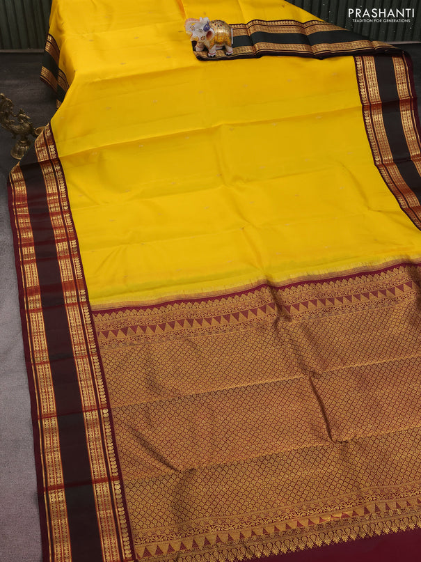 Pure kanchipuram silk saree yellow and wine shade with zari woven buttas and rettapet zari woven border