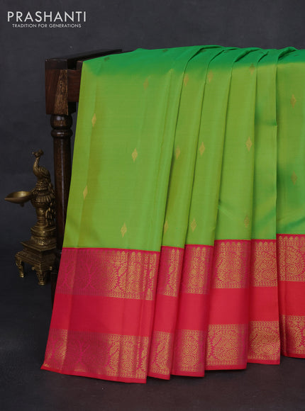 Pure kanchipuram silk saree light green and dual shade of pinkish orange with zari woven buttas and rettapet zari woven border