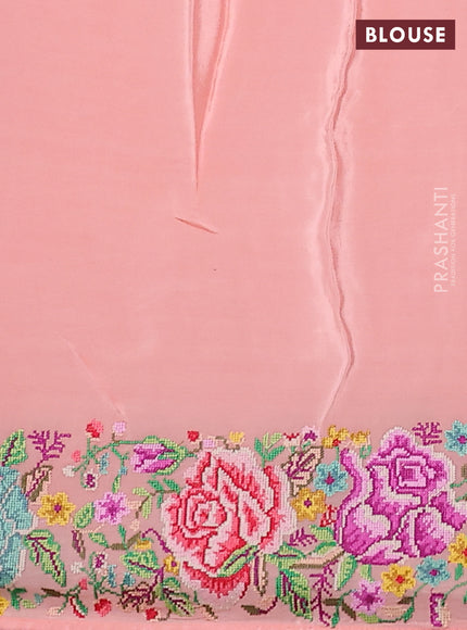 Pure organza silk saree peach shade with embroidery work buttas and floral design embroidery border