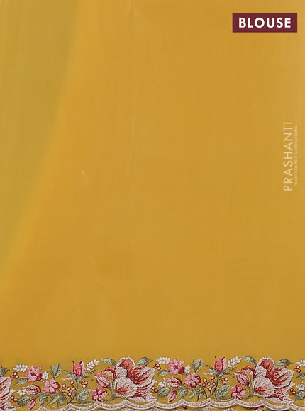 Pure organza silk saree yellow with embroidery work buttas and floral design embroidery border