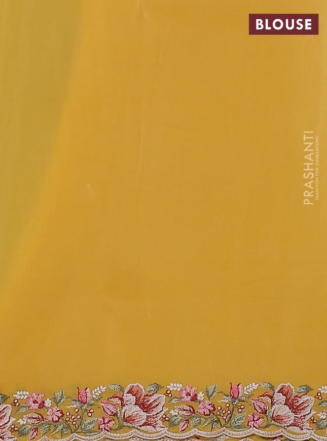Pure organza silk saree yellow with embroidery work buttas and floral design embroidery border