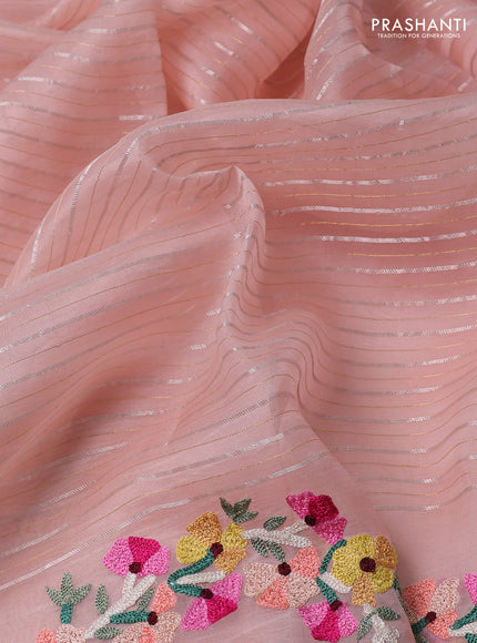 Pure organza silk saree pastel peach with allover silver & gold zari weaves and floral design embroidery border
