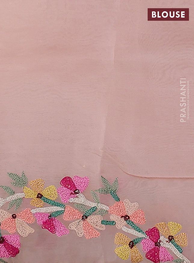 Pure organza silk saree pastel peach with allover silver & gold zari weaves and floral design embroidery border