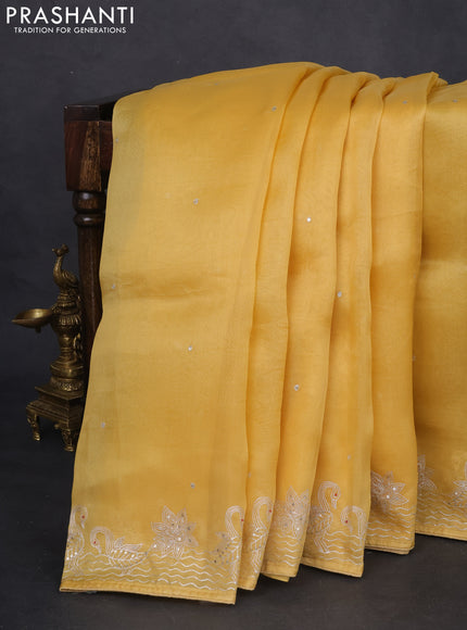 Pure organza silk saree mustard yellow with sequin work and zari woven border